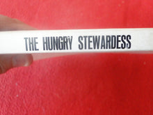 Load image into Gallery viewer, Vintage Sexy Erotic Adult Paperback Book/ Novel The Hungry Stewardess 1975 DAMAGED G3