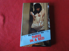 Load image into Gallery viewer, Vintage Adult Paperback Novel/Book The Infidelity File Three In A Bed X33