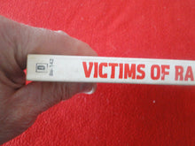 Load image into Gallery viewer, Vintage Adult Paperback Novel/Book Victims of Ranchi Eros Goldstripe 1976 HC3