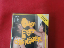 Load image into Gallery viewer, Vintage Erotic Adult Paperback Book/Novel Over Eager Cheerleader Greenleaf 1986     P54