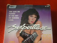 Load image into Gallery viewer, Vintage Adult XXX VHS Porn Tape Movie Sexpertease MIndy Rae Kari Foxx   X20
