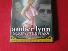 Load image into Gallery viewer, Vintage Adult Erotic Sexy Porn XXX DVD Movie Amber Lynn Screws The Stars       X
