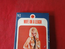 Load image into Gallery viewer, Vintage Erotic Porn Paperback Book/Novel Wife On A Leash Greenleaf 1973 DAMAGED COVER  X33
