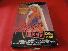 Load image into Gallery viewer, Vintage Adult XXX VHS Porn Tape X-Rated Amber Pays The Rent Taija Rae Amber Lynn X2m
