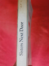 Load image into Gallery viewer, Vintage Adult Paperback Novel/Book Sisters Next Door               PB5
