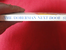 Load image into Gallery viewer, Vintage Erotic Adult Paperback Book/Novel The Doberman Next Door      G2
