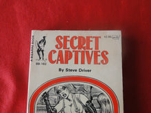 Load image into Gallery viewer, Vintage Erotic Adult Paperback Book/Novel Secret Captives Bill Ward 1980    HC3
