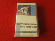Load image into Gallery viewer, Vintage Adult Erotic Gay Interest VHS Tape BDSM Captured Poked and Foot-Fed
