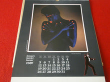 Load image into Gallery viewer, Vintage Large Semi-Nude Pinup Wall Calendar 1987 James Bond Girls 18 x 13.5    D
